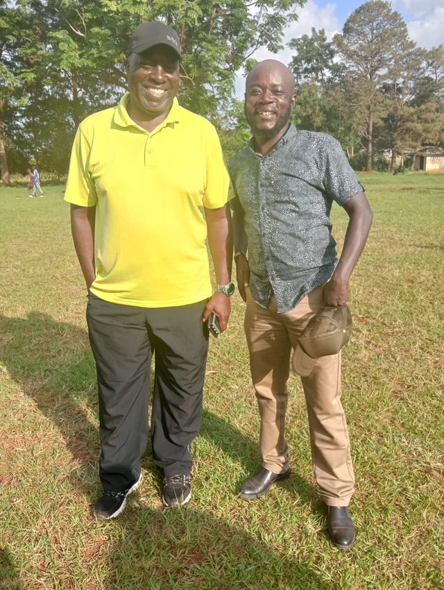 Coach Gilbert Selebwa poses for a photo with HOHA CEO Fred Munuku after sealing a deal for his move